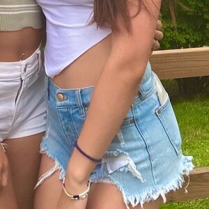 celebrity pink ripped blue jean shorts